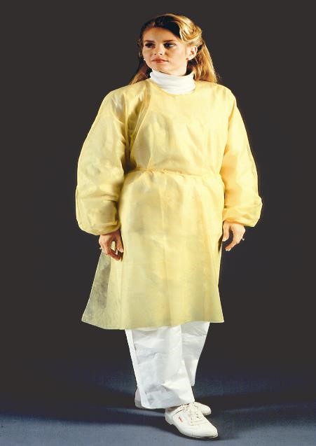 A woman in yellow lab coat and white pants.