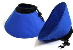 A blue hat and some other items on the ground